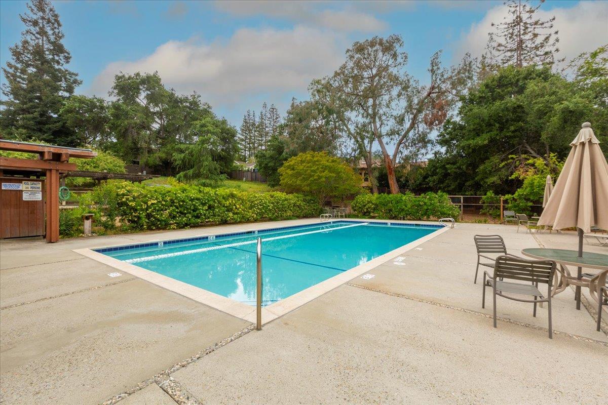 4 Farm Road Los Altos, CA 94024 - Photo 40 of 44 a view of a swimming pool with a lounge chair