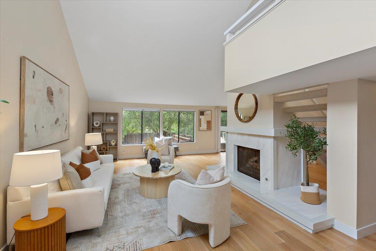 4 Farm Road Los Altos, CA 94024 - Photo 4 of 44 a living room with furniture a fireplace and a potted plant