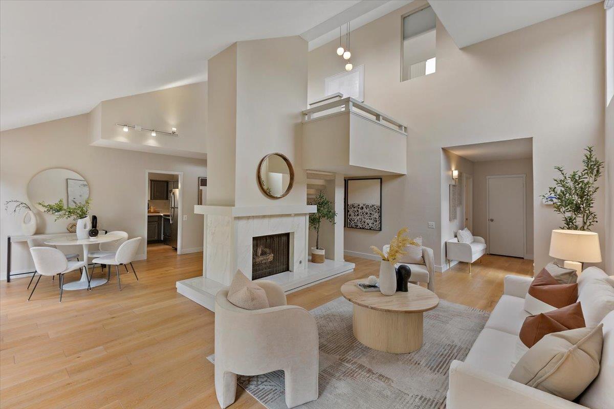 4 Farm Road Los Altos, CA 94024 - Photo 6 of 44 a living room with furniture and a fireplace