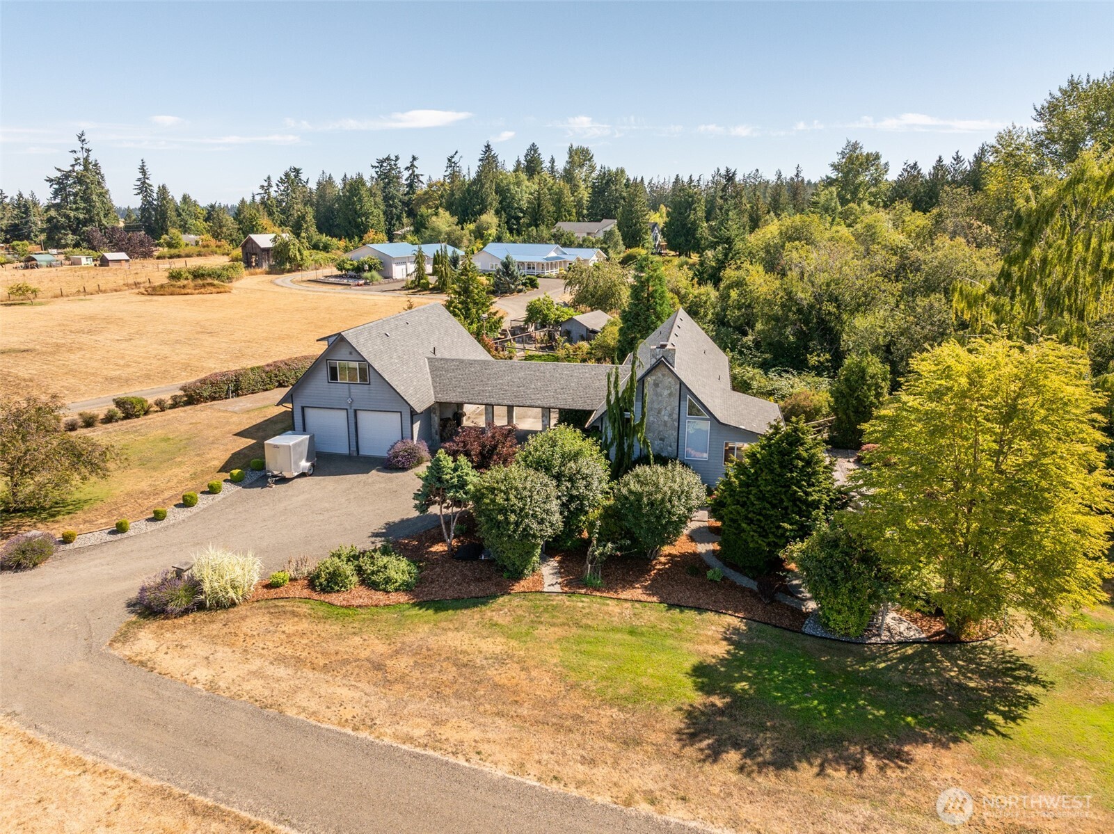72 Skunk Hollow Road Sequim, WA 98382 - Photo 1 of 40 a view of a houses with city and ocean