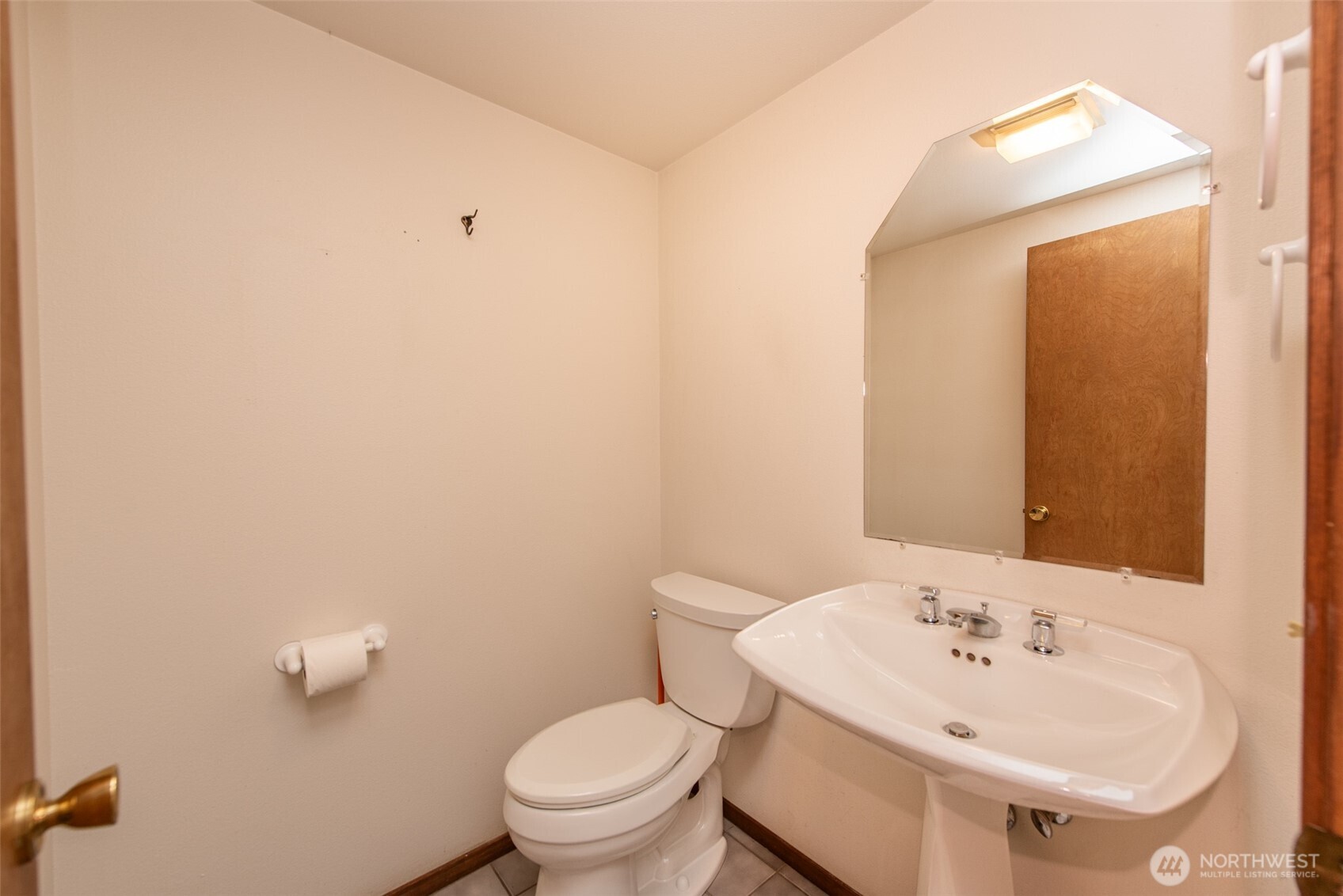 72 Skunk Hollow Road Sequim, WA 98382 - Photo 11 of 40 a bathroom with a sink a toilet and mirror