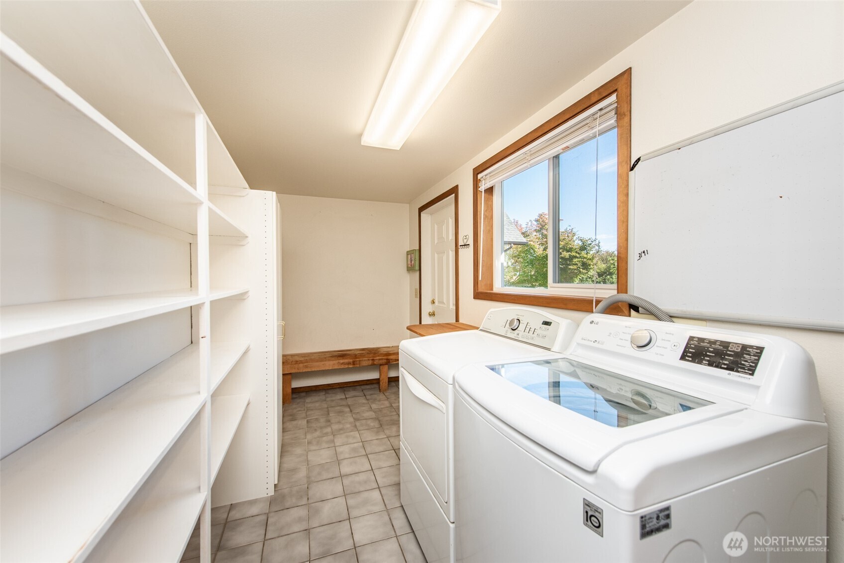 72 Skunk Hollow Road Sequim, WA 98382 - Photo 12 of 40 a utility room with dryer and washer