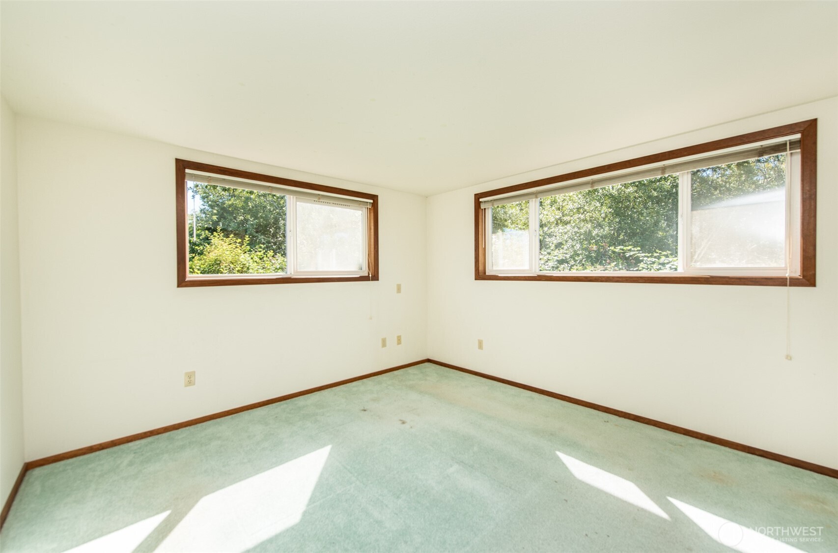 72 Skunk Hollow Road Sequim, WA 98382 - Photo 15 of 40 an empty room with a window