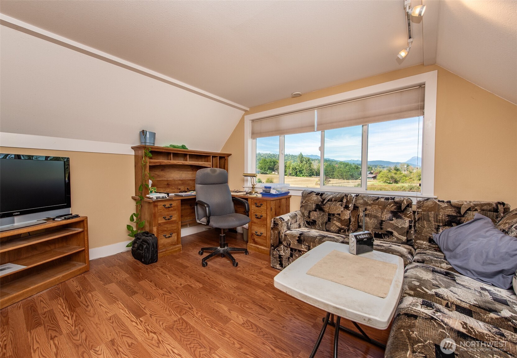 72 Skunk Hollow Road Sequim, WA 98382 - Photo 24 of 40 a room with furniture and a flat screen tv