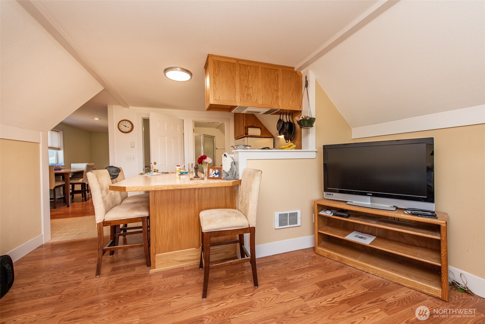 72 Skunk Hollow Road Sequim, WA 98382 - Photo 25 of 40 a living room with furniture and a flat screen tv