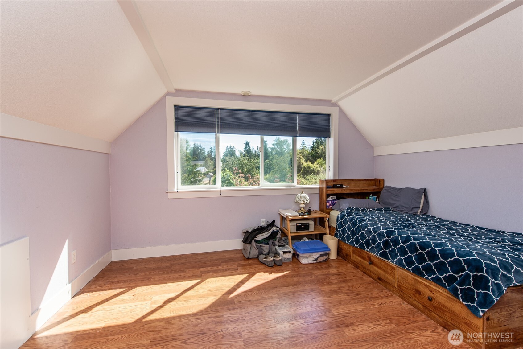 72 Skunk Hollow Road Sequim, WA 98382 - Photo 28 of 40 a bed room with a bed and a window