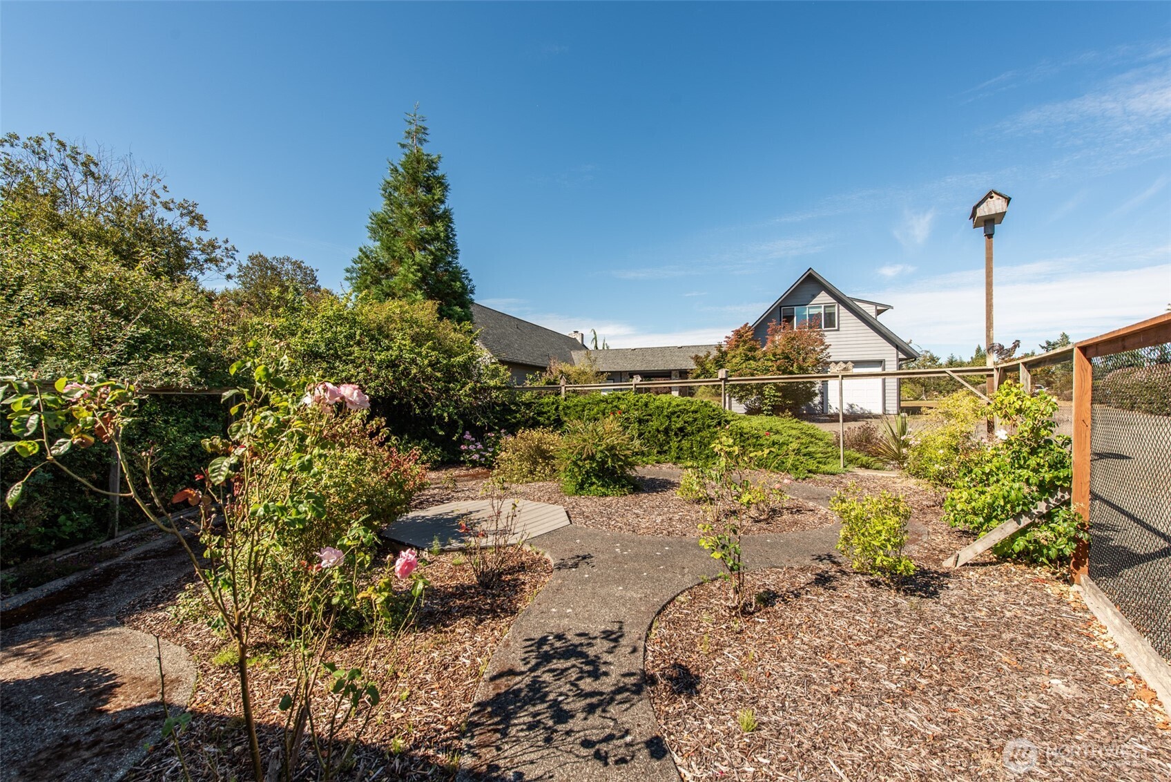 72 Skunk Hollow Road Sequim, WA 98382 - Photo 38 of 40 a view of a house with a yard