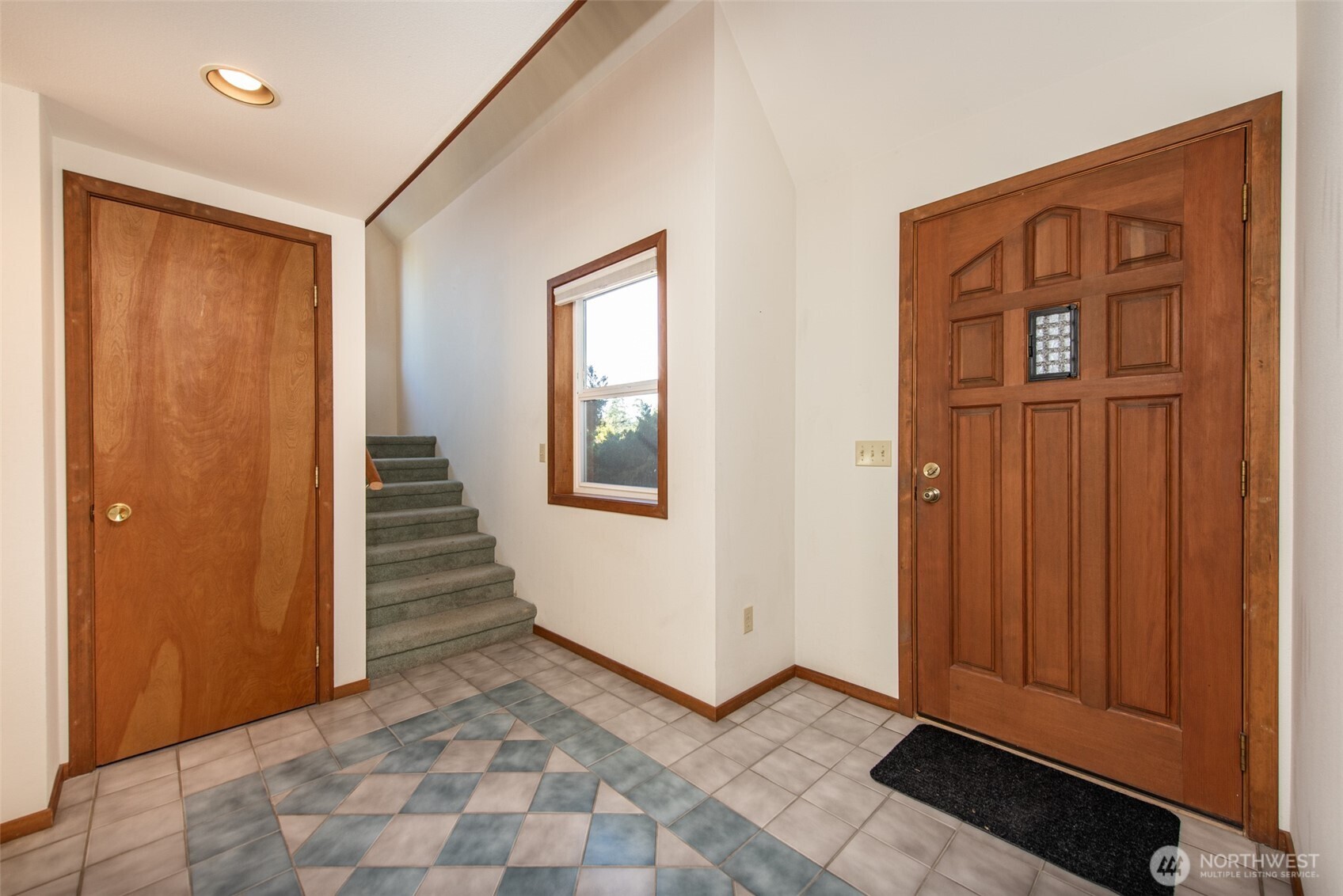 72 Skunk Hollow Road Sequim, WA 98382 - Photo 4 of 40 a view of a hallway with wooden floor and entryway
