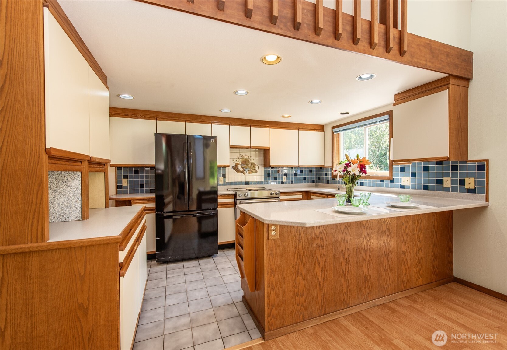 72 Skunk Hollow Road Sequim, WA 98382 - Photo 8 of 40 a kitchen with stainless steel appliances granite countertop a refrigerator a sink and a stove