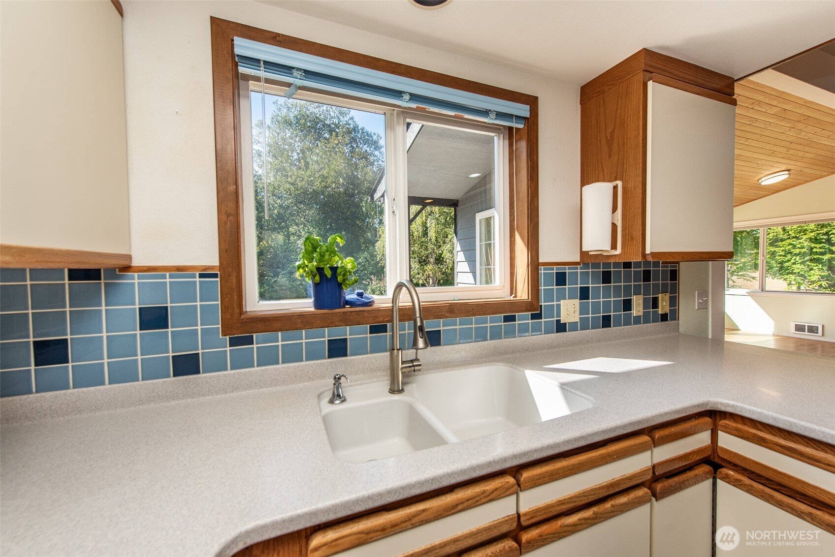 72 Skunk Hollow Road Sequim, WA 98382 - Photo 10 of 40 a kitchen with a sink and a window