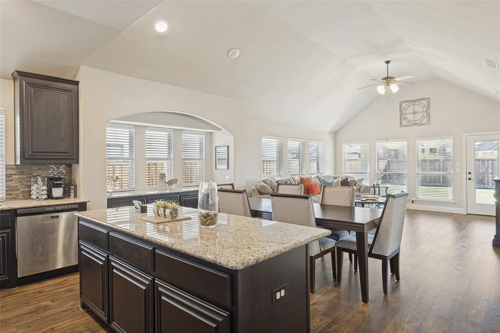 3405 Fletcher Road Heartland, TX 75114 - Photo 11 of 30 Another view of kitchen over looking dining area and living area.