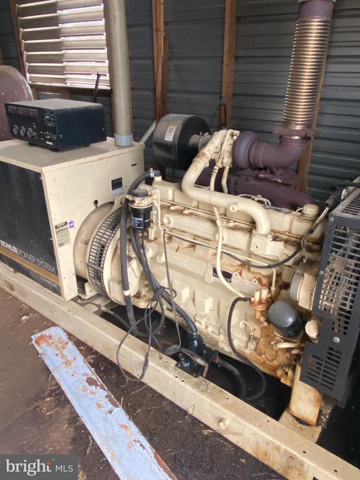 27160 Cash Corner Road Crisfield, MD 21817 - Photo 28 of 62 a view of walk in closet with clothes
