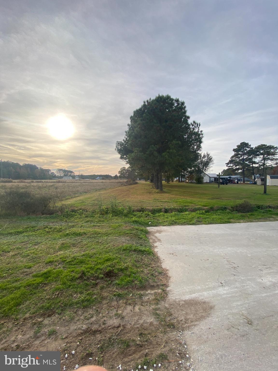 27160 Cash Corner Road Crisfield, MD 21817 - Photo 6 of 62 a view of a lake with a big yard