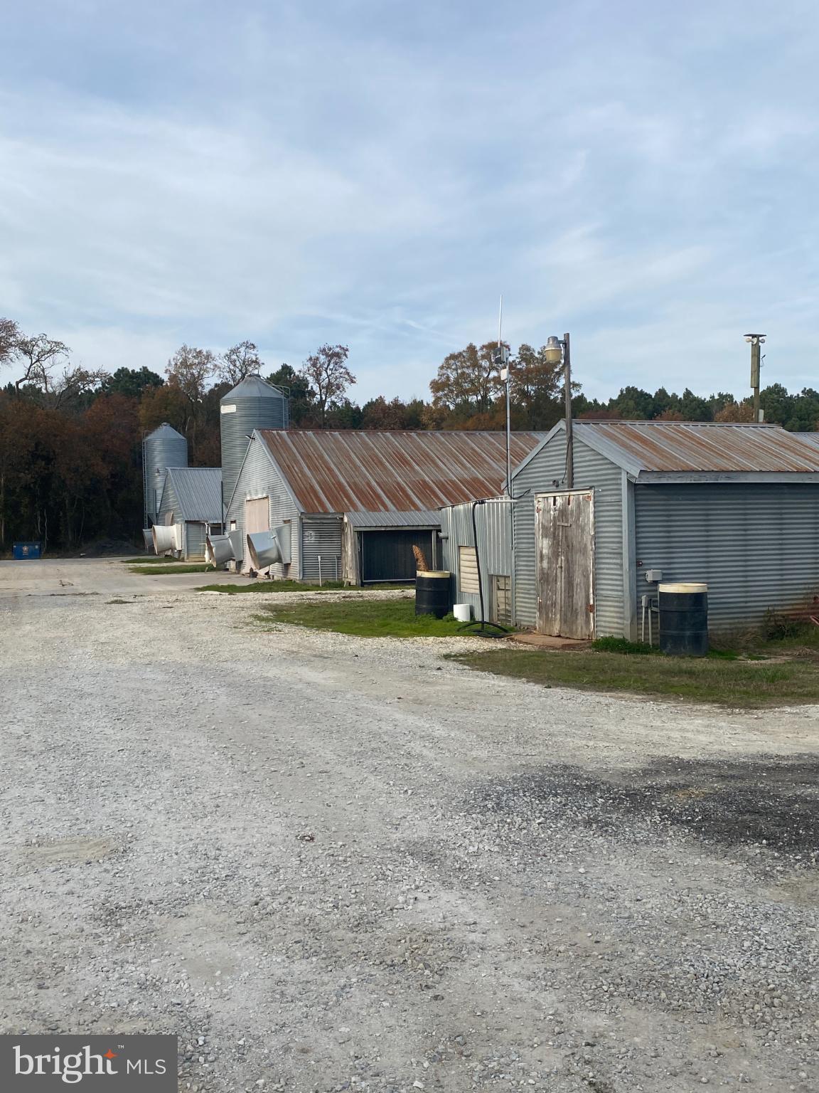 27160 Cash Corner Road Crisfield, MD 21817 - Photo 8 of 62 a aerial view of a house with a yard and balcony