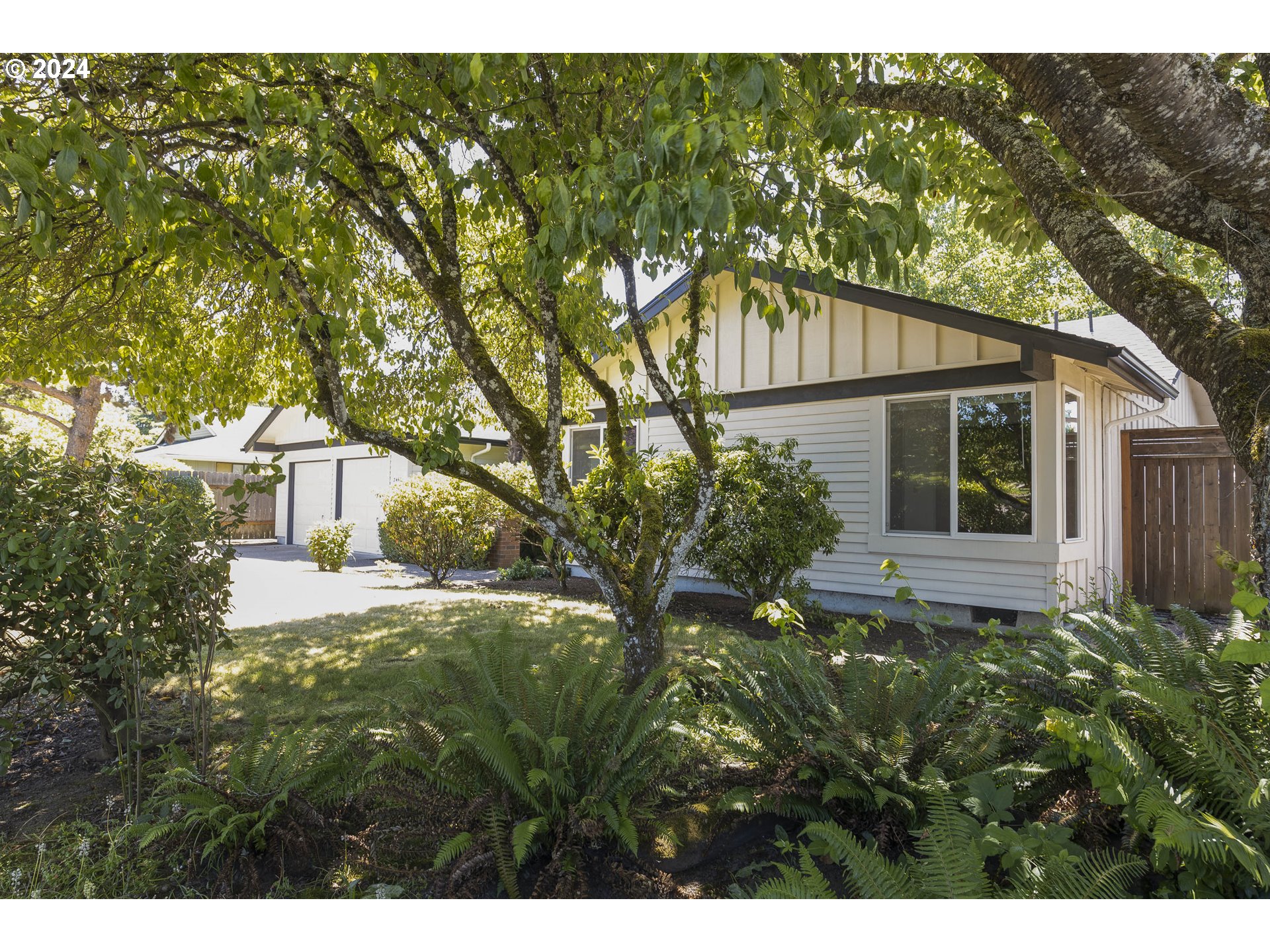 2466 Erin Way Eugene, OR 97408 - Photo 1 of 31 a house view with a outdoor space