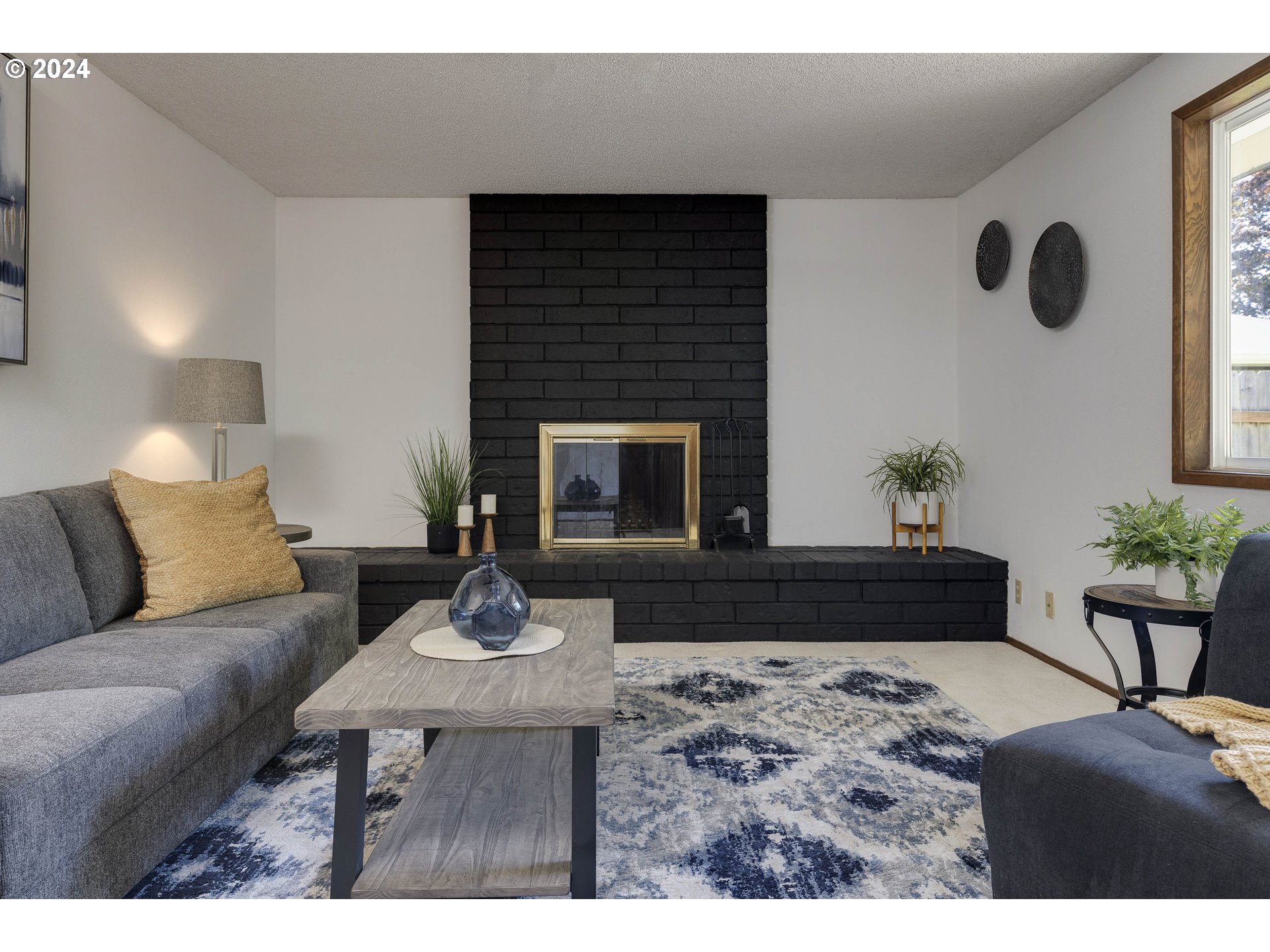 2466 Erin Way Eugene, OR 97408 - Photo 14 of 31 a living room with furniture and a fireplace