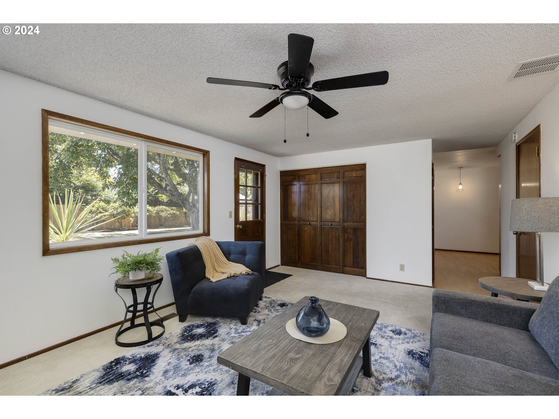 2466 Erin Way Eugene, OR 97408 - Photo 16 of 31 a living room with furniture and a window