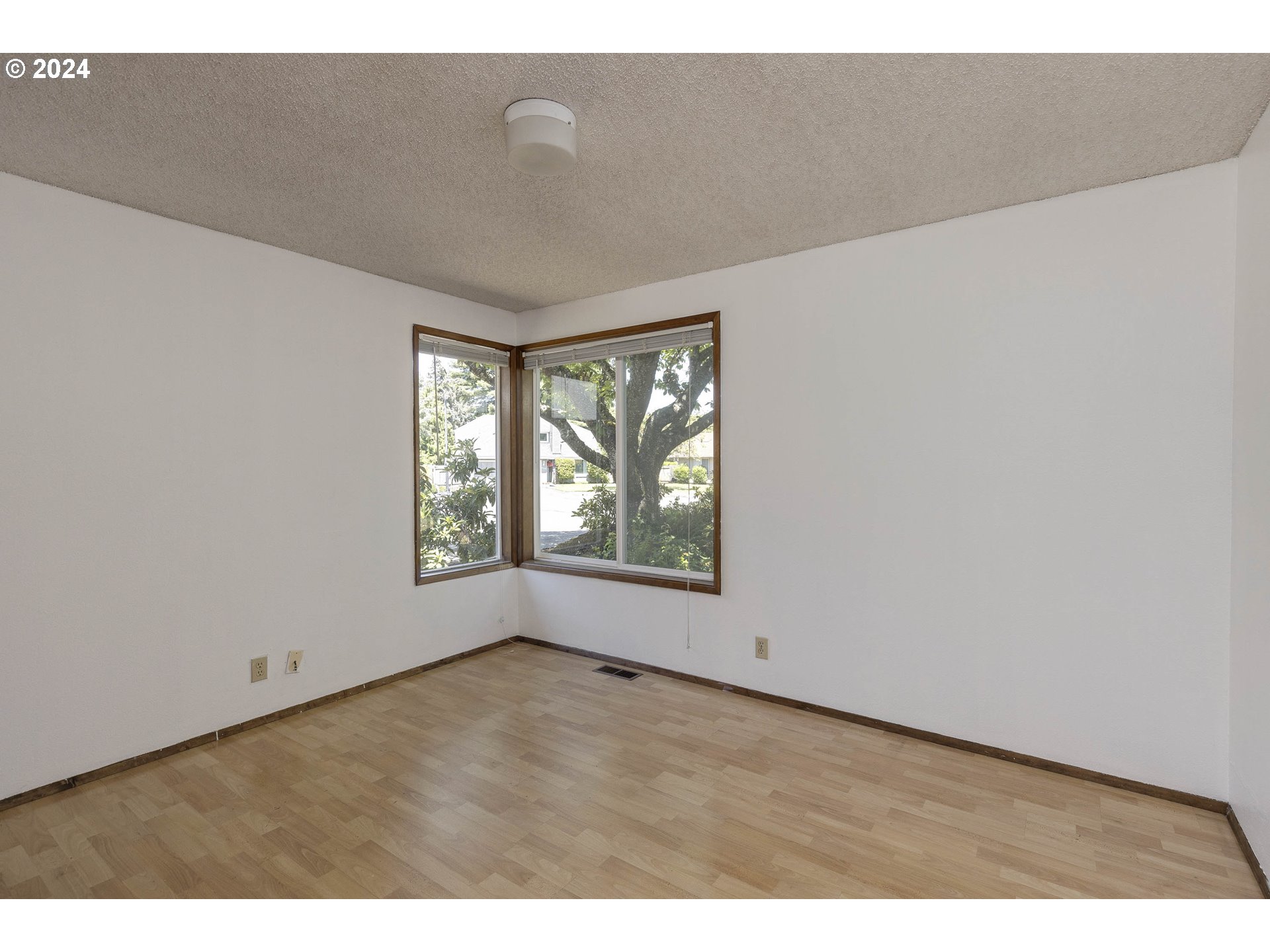 2466 Erin Way Eugene, OR 97408 - Photo 24 of 31 a view of an empty room with a window