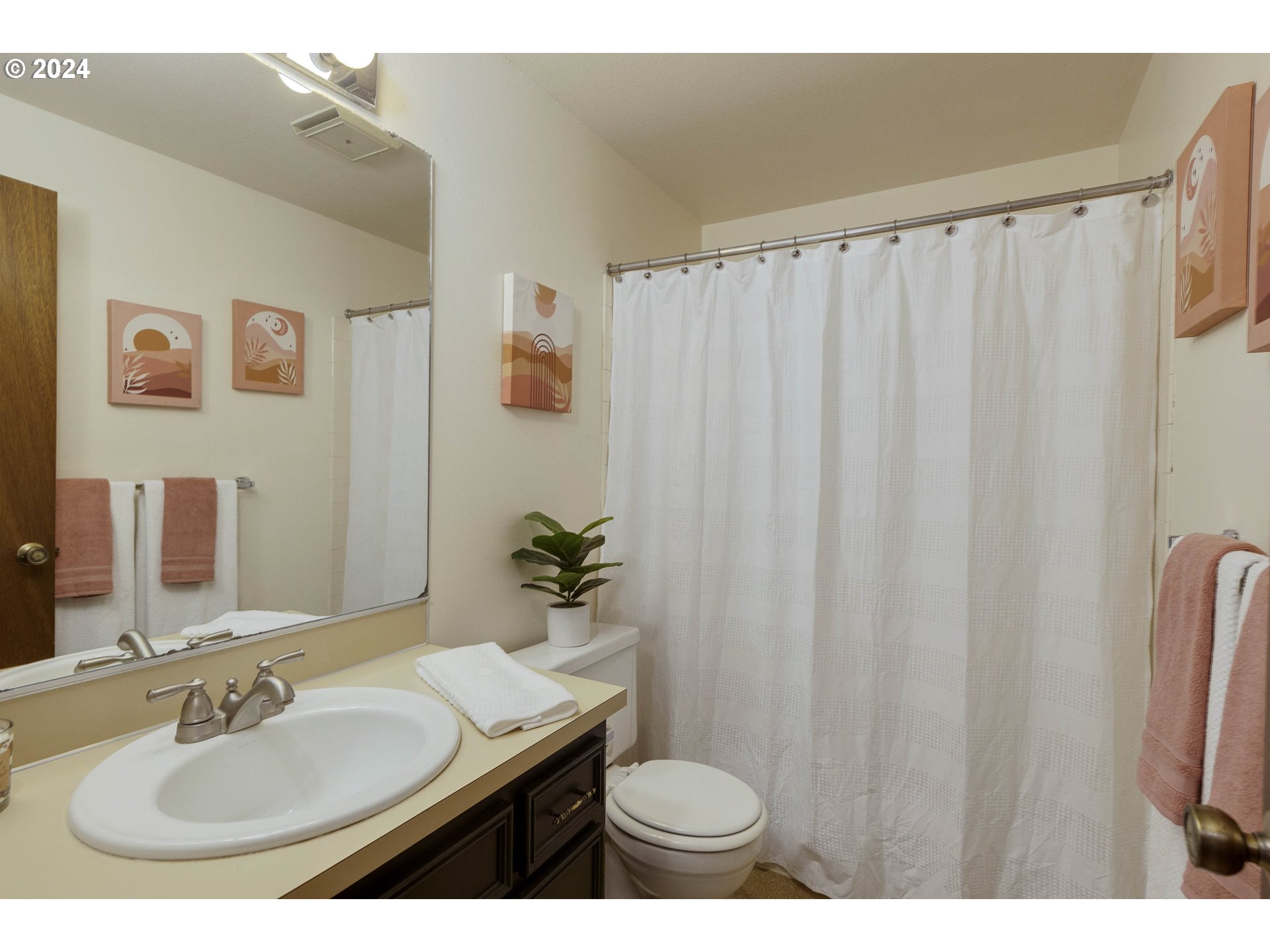 2466 Erin Way Eugene, OR 97408 - Photo 26 of 31 a bathroom with a sink and a mirror