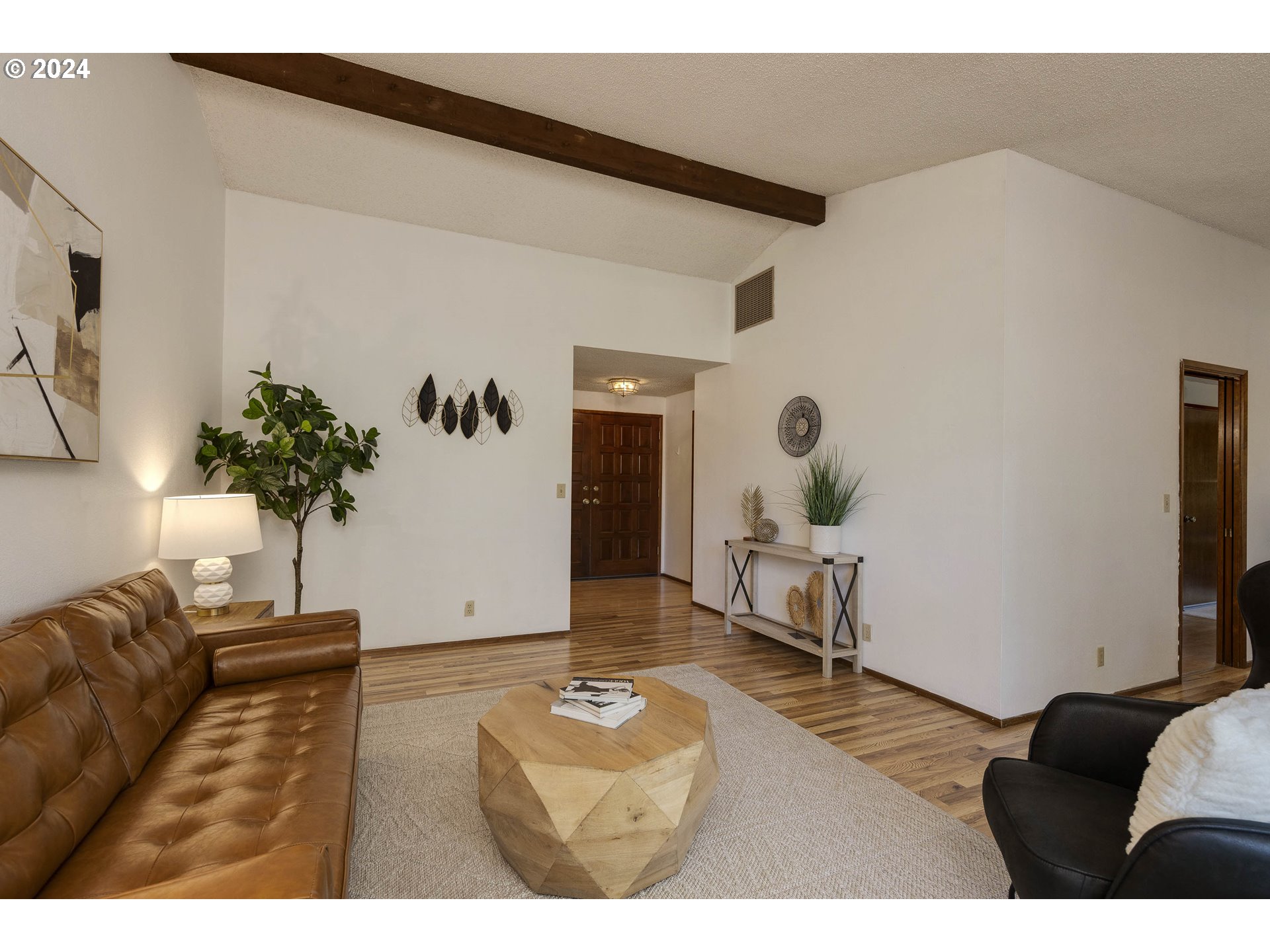 2466 Erin Way Eugene, OR 97408 - Photo 4 of 31 a living room with furniture and a potted plant