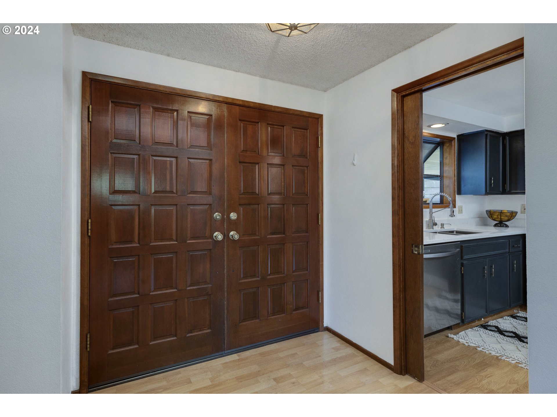 2466 Erin Way Eugene, OR 97408 - Photo 7 of 31 a bathroom with a sink and a mirror