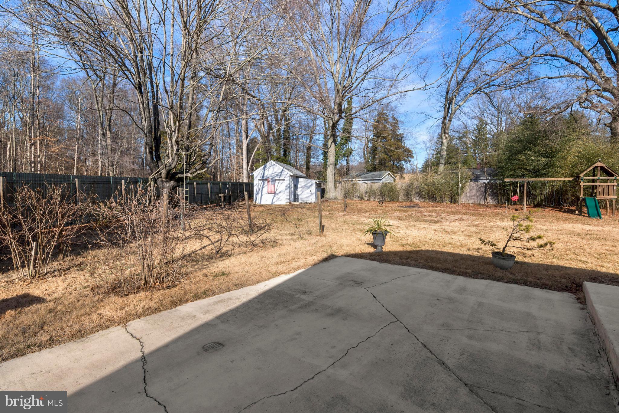3749 Ridgewood Road Davidsonville, MD 21035 - Photo 27 of 28 Exterior yard and parking pad/ detached garage