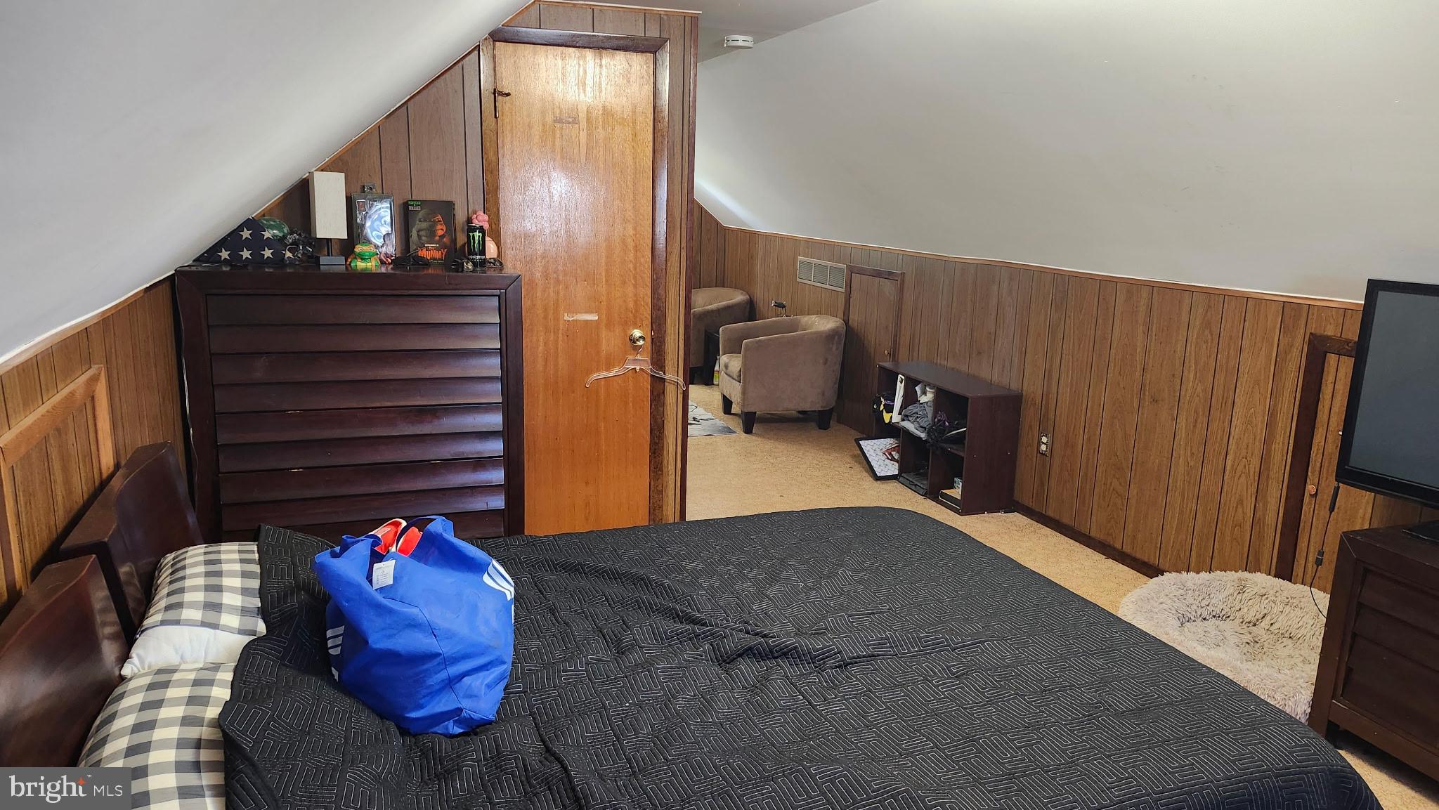24 Forman Drive Hamilton, NJ 08690 - Photo 11 of 17 Cozy attic retreat with warm wood tones.