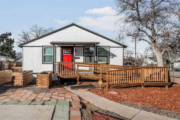 a front view of a house with a patio