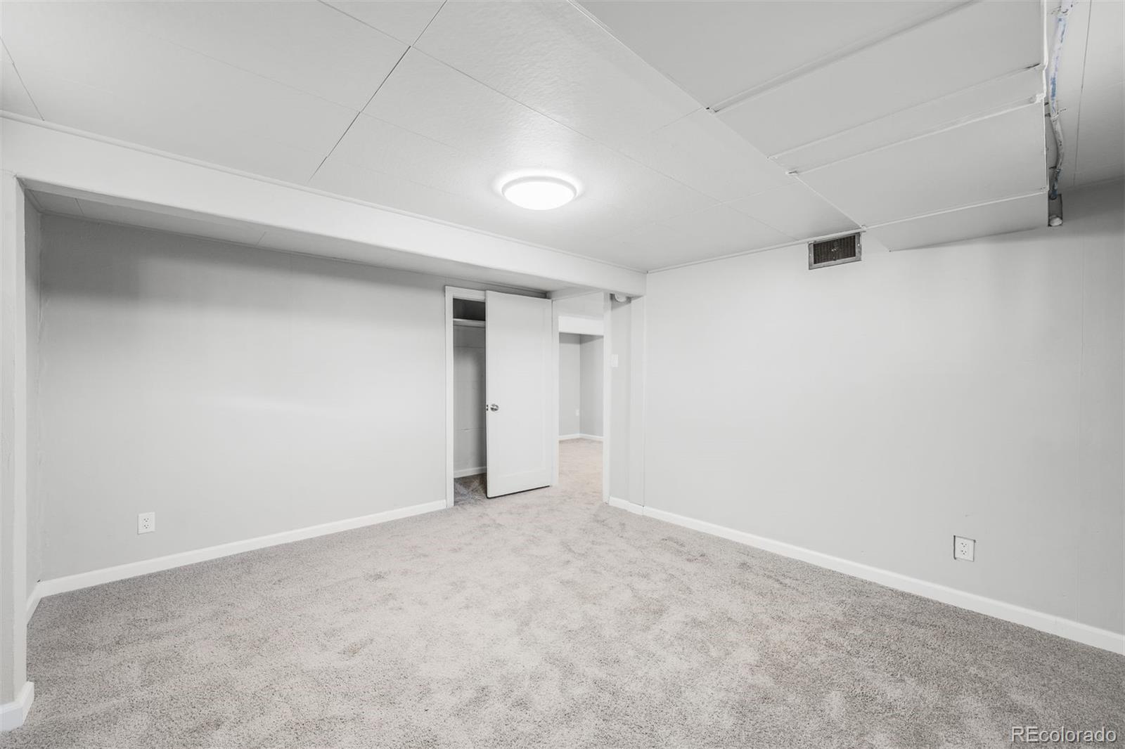 1187 Syracuse Street Denver, CO 80220 - Photo 25 of 34 a view of an empty room