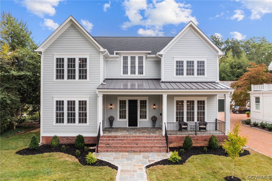 front view of a house with a yard