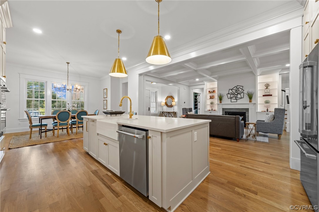 3611 Brook Road Richmond, VA 23227 - Photo 17 of 49 a kitchen with sink cabinets and dining table