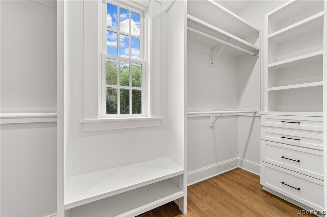 3611 Brook Road Richmond, VA 23227 - Photo 27 of 49 a view of walk in closet with wooden floor