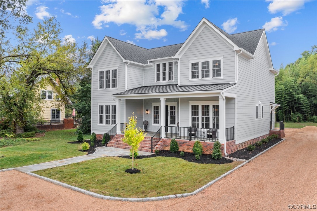 3611 Brook Road Richmond, VA 23227 - Photo 3 of 49 a front view of a house with a yard