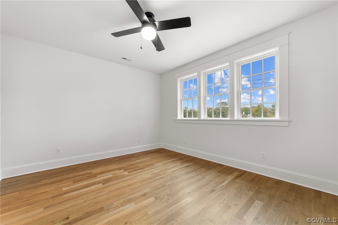 3611 Brook Road Richmond, VA 23227 - Photo 39 of 49 a view of empty room with wooden floor and fan