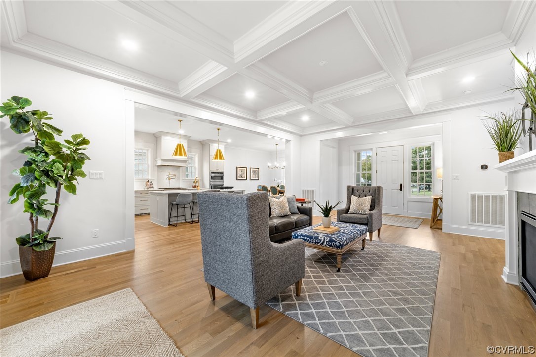 3611 Brook Road Richmond, VA 23227 - Photo 9 of 49 a living room with furniture and potted plants with wooden floor