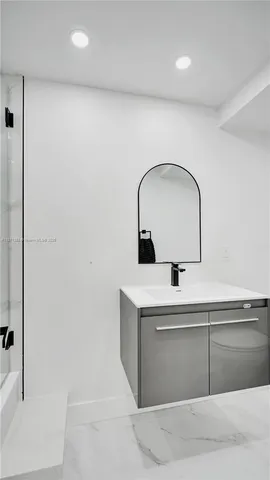 a view of cabinets a sink and dishwasher in a room