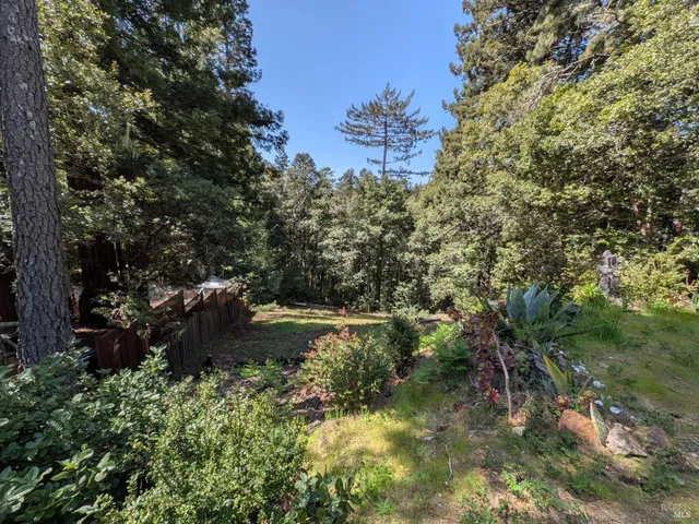 a view of a lake with a building in the background