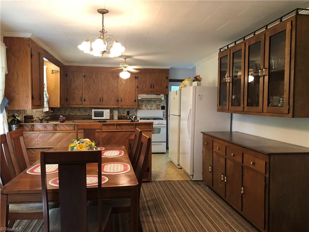 1151 Ed Booth Road Westfield, NC 27053 - Photo 14 of 29 Dining room and Kitchen