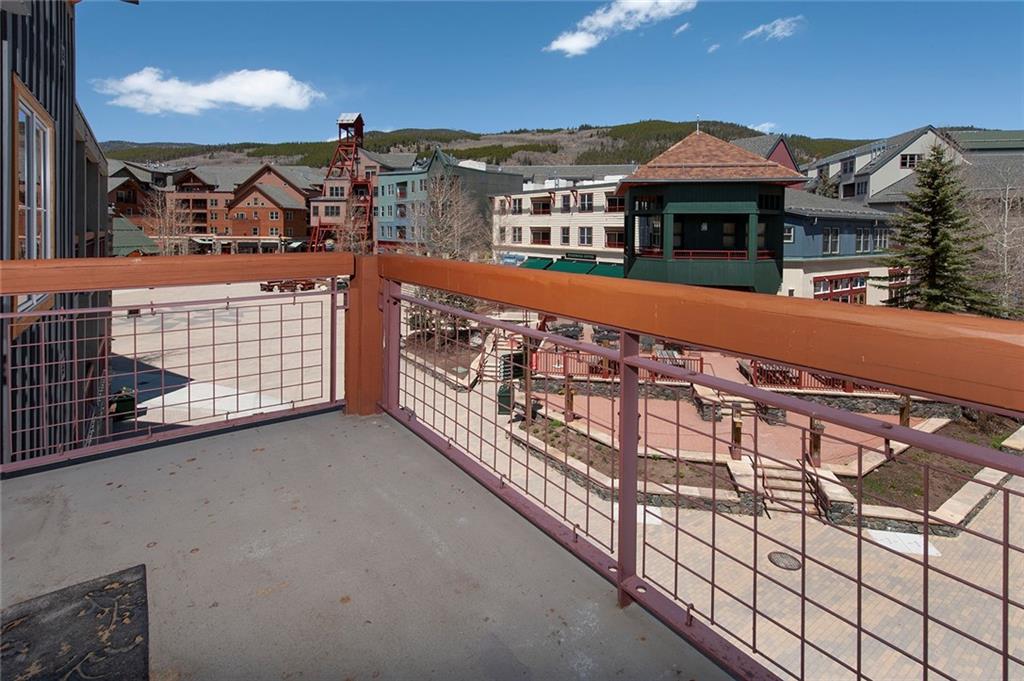 129 River Run Road, Unit 8058 Keystone, CO 80435 - Photo 4 of 35 a view of a balcony with a fireplace