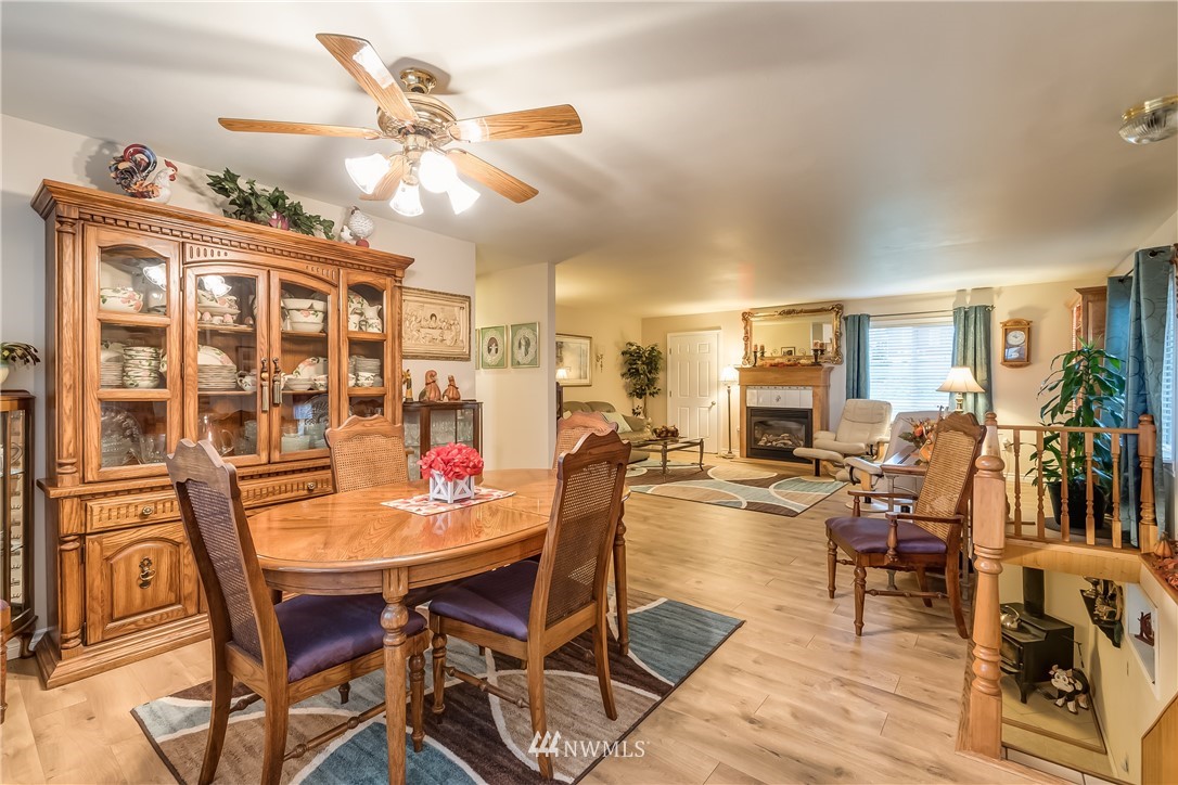 8883 North Pass Road Sumas, WA 98295 - Photo 18 of 25 a dining room filled with lots of furniture and wooden floor