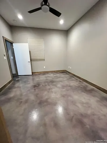 an empty room with a projector