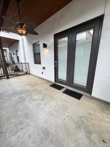 a view of a backyard with sitting area