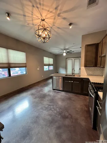 a large kitchen with a large window