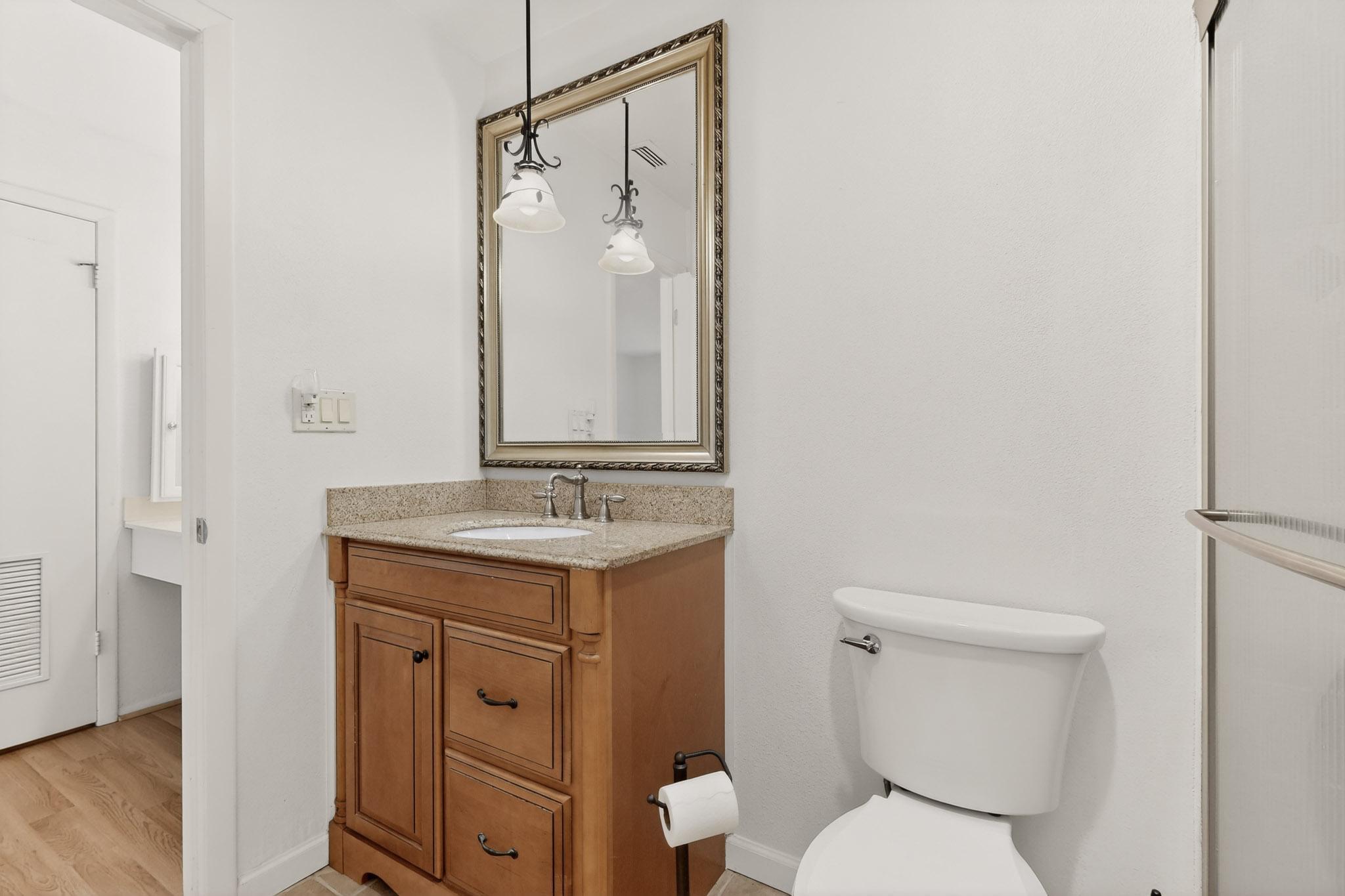 8210 Bent Tree Road, Unit 104 Austin, TX 78759 - Photo 22 of 39 Bathroom featuring vanity and light wood-type flooring