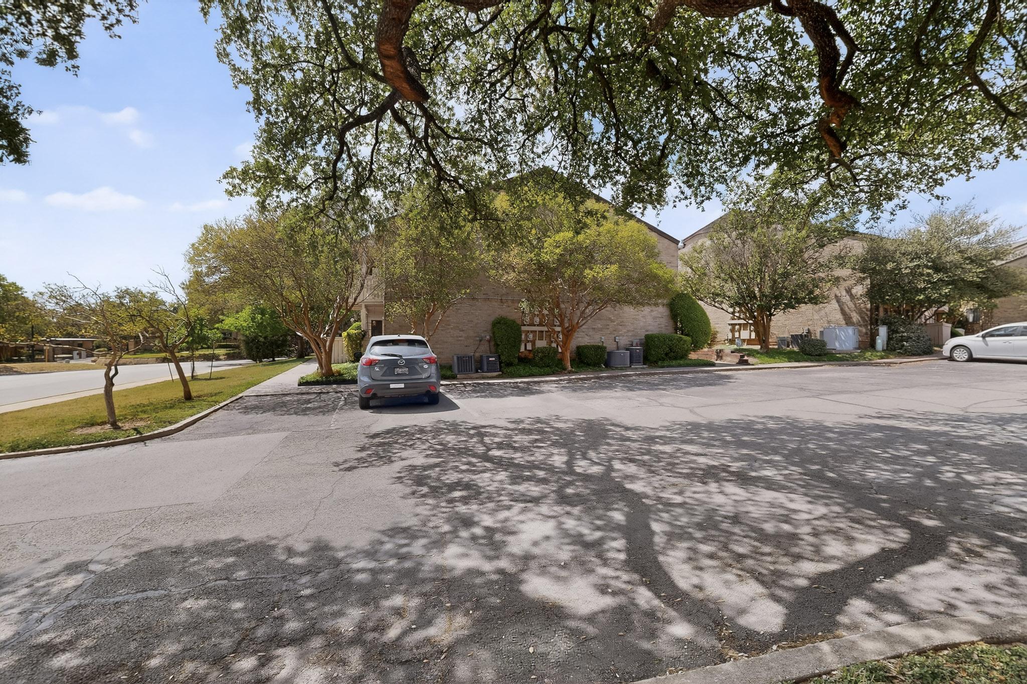 8210 Bent Tree Road, Unit 104 Austin, TX 78759 - Photo 38 of 39 View of front of property with uncovered parking