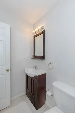 a bedroom with a bed and furniture