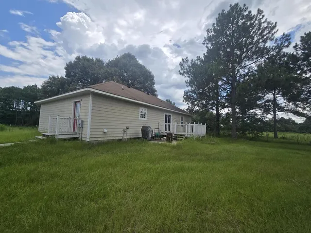 a view of a golf course with a lake