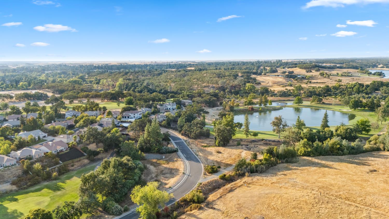 7316 Bermuda Court Rancho Murieta, CA 95683 - Photo 32 of 39 an aerial view of residential house with outdoor space and trees