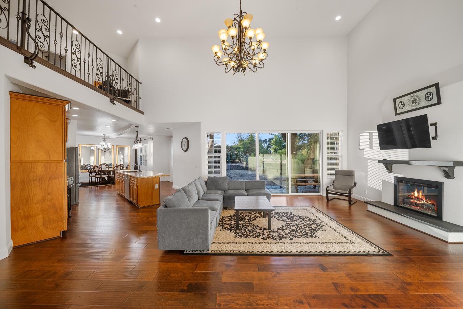 7316 Bermuda Court Rancho Murieta, CA 95683 - Photo 6 of 39 a living room with fireplace furniture and a fireplace
