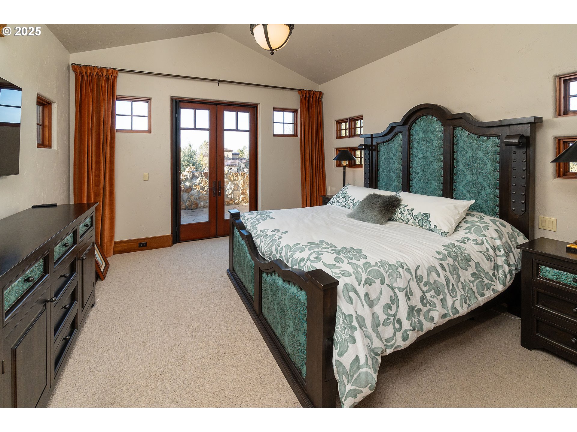 23021 Brushline Court Bend, OR 97701 - Photo 11 of 44 a bedroom with a bed next to a window with outer view